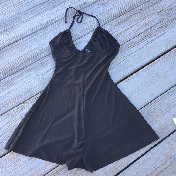 back less black romper with ties neck and open under chest. - Picture 1 of 8